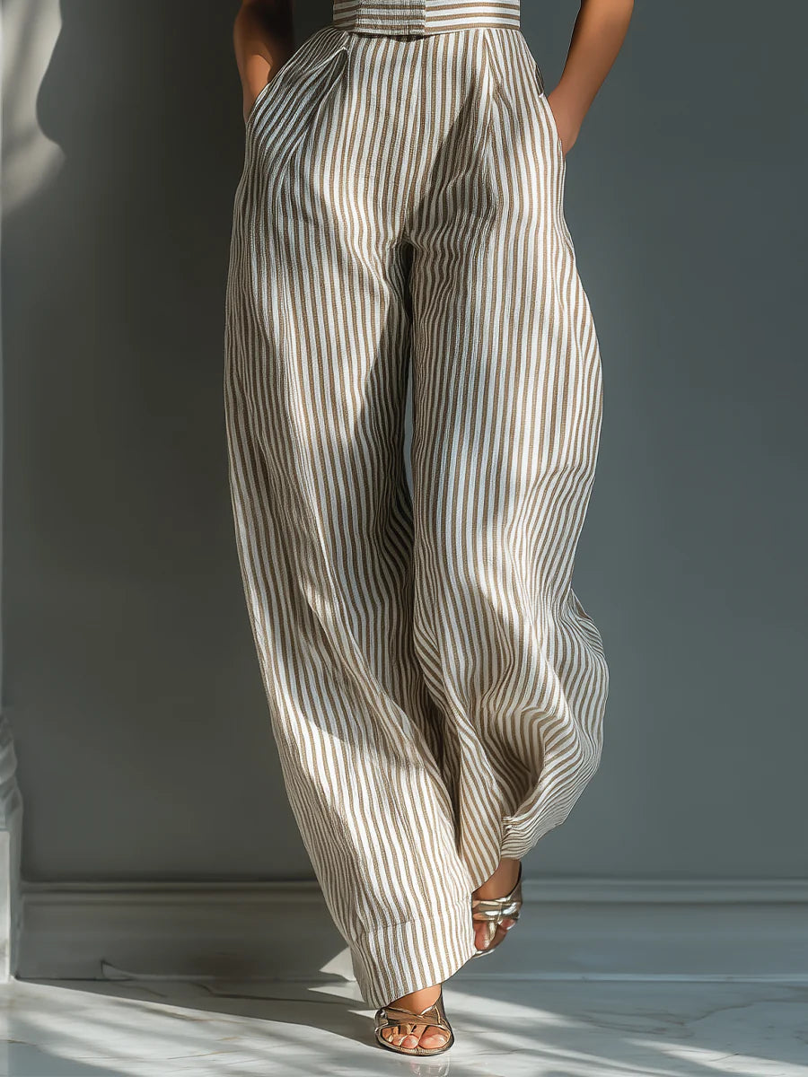 Mono de lino mezcla beige con rayas, hombros con lazo y pierna ancha