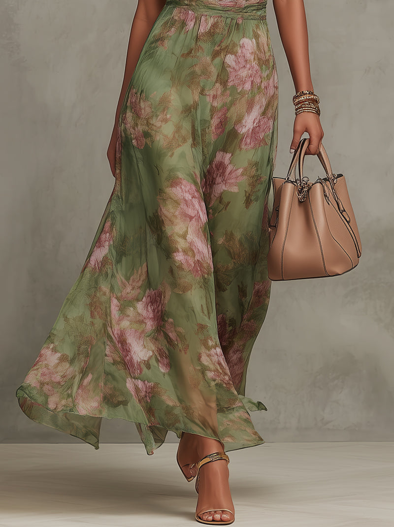 Vestido largo de gasa verde con estampado floral y cuello halter
