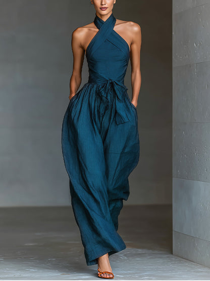 Mono de lino azul marino con espalda cruzada y pantalones anchos
