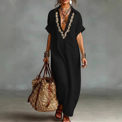 Vestido largo minimalista de lino mezclado con bordado y mangas cortas