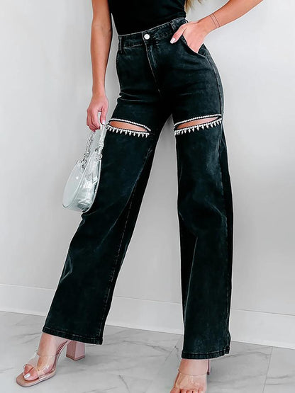 Jeans rectos desgastados con detalles de strass