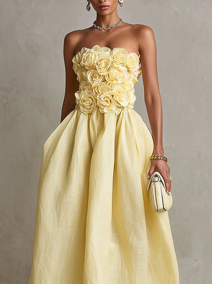 Vestido midi amarillo sin tirantes con flor 3D