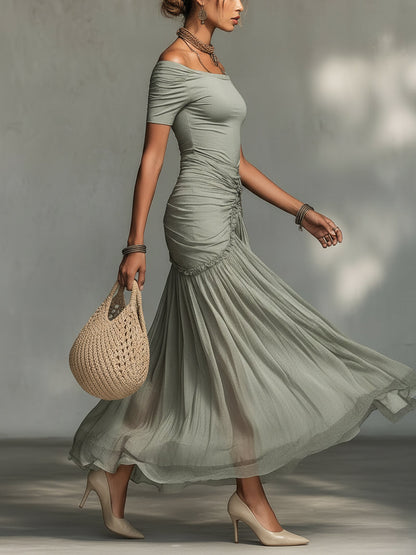 Vestido maxi gris de tela elástica y gasa