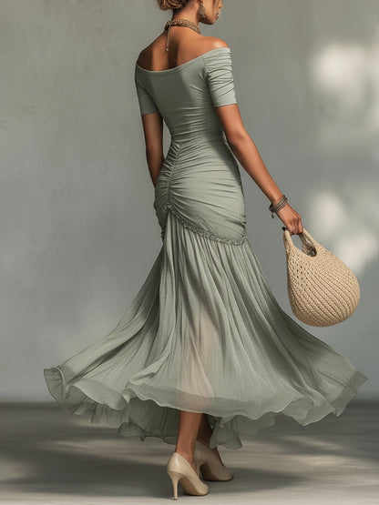 Vestido maxi gris de tela elástica y gasa
