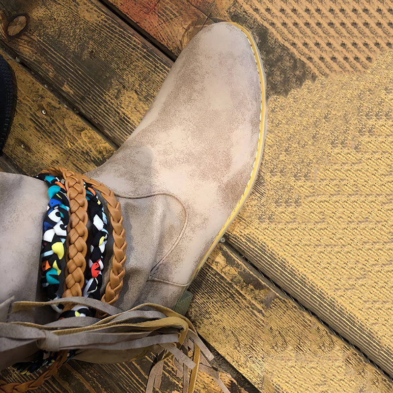 Botas vintage occidentales tribales con borlas y tobilleras