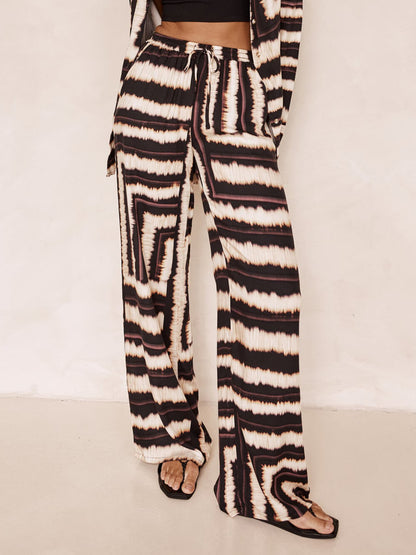 Conjunto de pantalones holgados con estampado de chocolate texturizado y tiras exclusivas