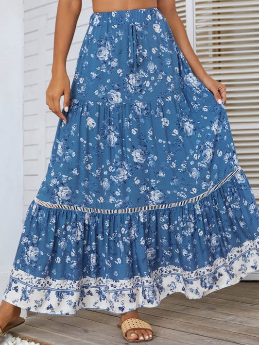 Falda azul con detalle de ojales y cintura alta