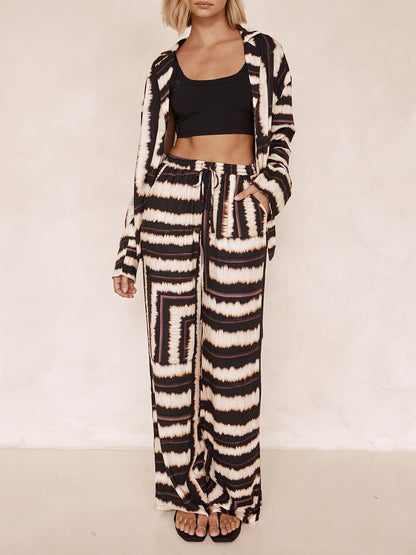 Conjunto de pantalones holgados con estampado de chocolate texturizado y tiras exclusivas