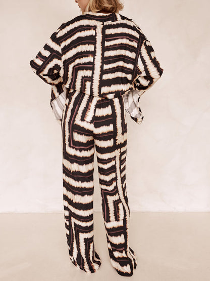 Conjunto de pantalones holgados con estampado de chocolate texturizado y tiras exclusivas