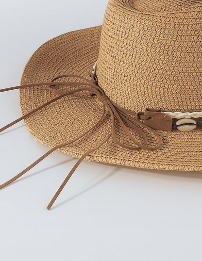 Sombrero de paja con borlas de conchas