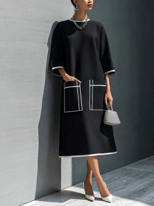 Vestido midi con bolsillo y costuras en contraste
