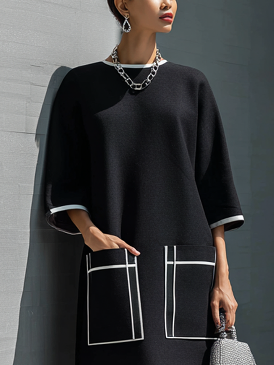 Vestido midi con bolsillo y costuras en contraste