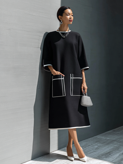 Vestido midi con bolsillo y costuras en contraste