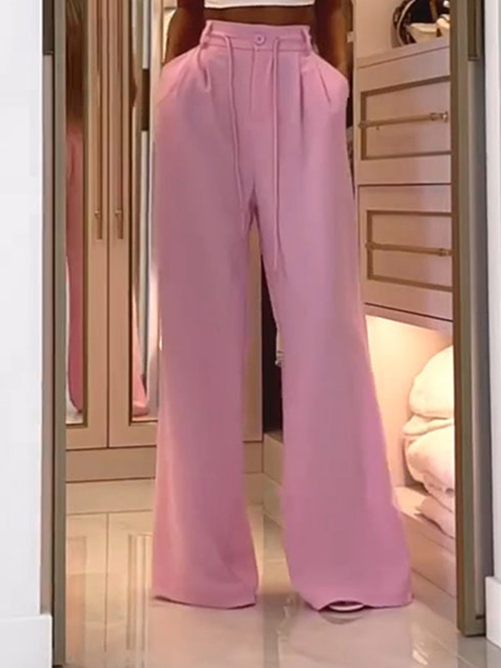 Pantalones plisados rosas de American Street