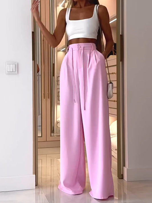 Pantalones plisados rosas de American Street