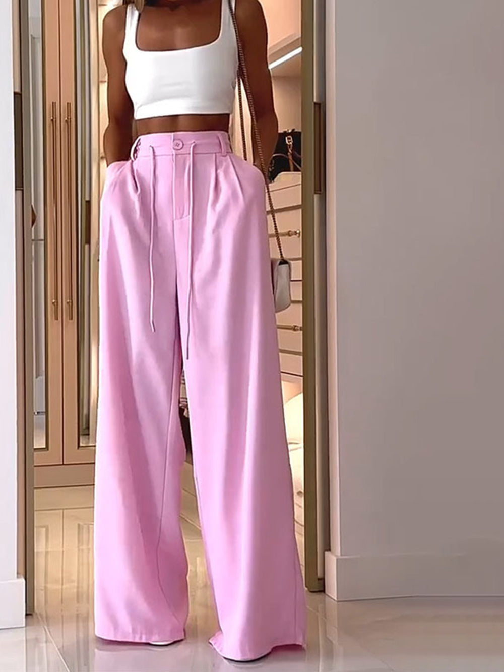 Pantalones plisados rosas de American Street