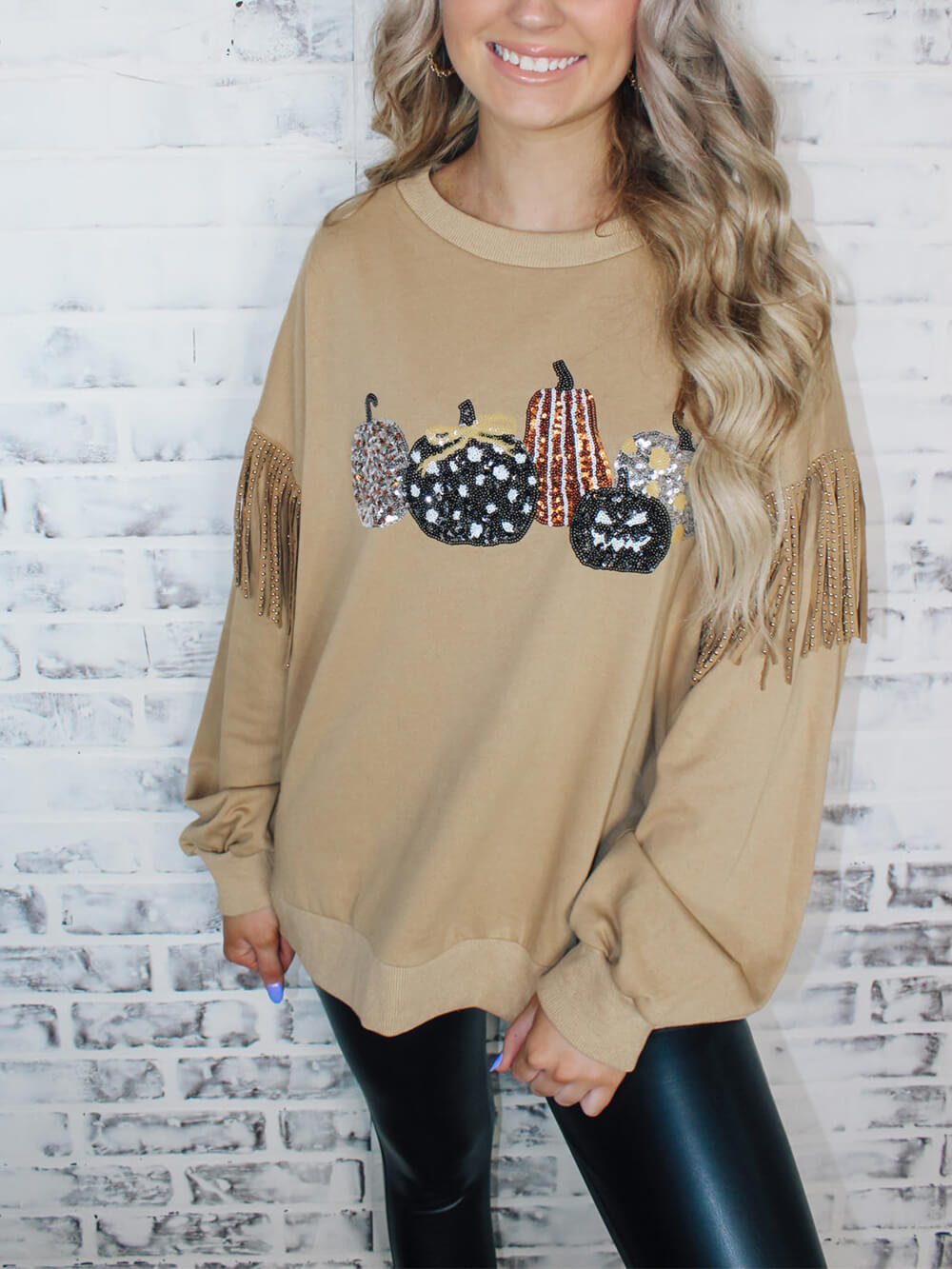 Top de manga con flecos y lentejuelas de calabaza