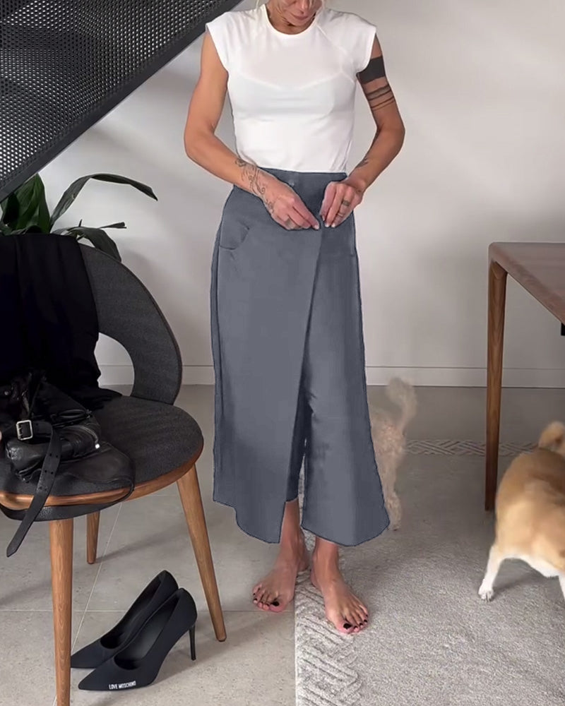 Pantalón casual liso de color único con corte asimétrico