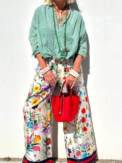 Conjunto de pantalones de pierna ancha con bolsillos y cintura elástica con estampado floral único
