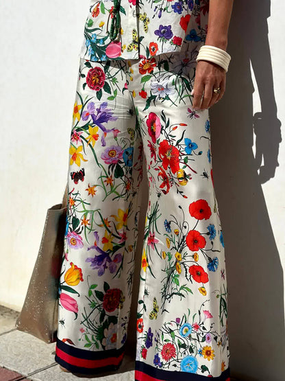 Conjunto de pantalones de pierna ancha con bolsillos y cintura elástica con estampado floral único