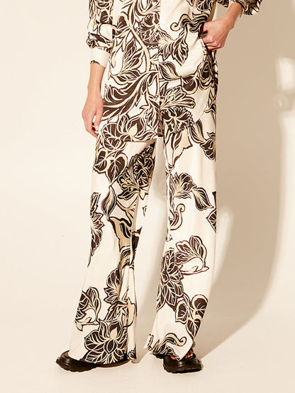 Exquisitos pantalones de pierna ancha con bolsillo suelto elástico con estampado floral