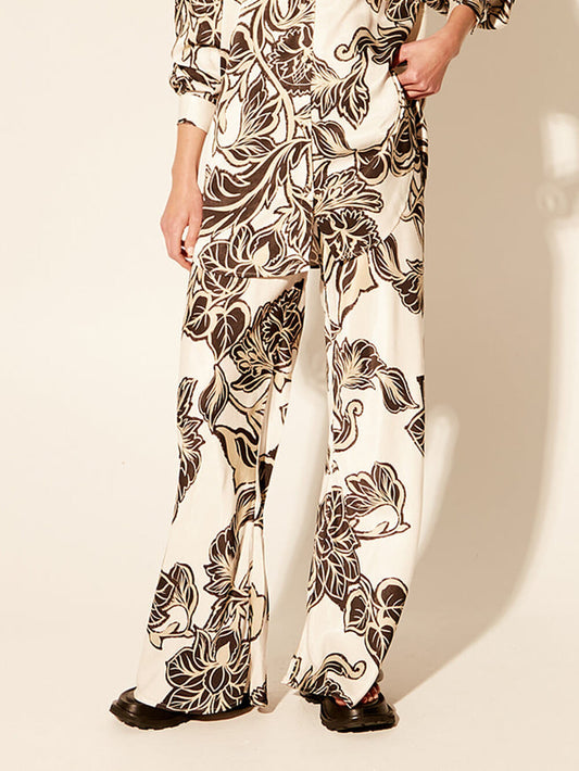 Exquisitos pantalones de pierna ancha con bolsillo suelto elástico con estampado floral