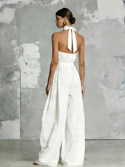 Elegante mono blanco tejido sin mangas con cuello halter