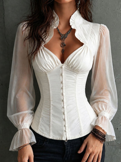 Blusa romántica con corsé y volantes