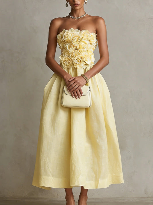Vestido midi amarillo sin tirantes con flor 3D