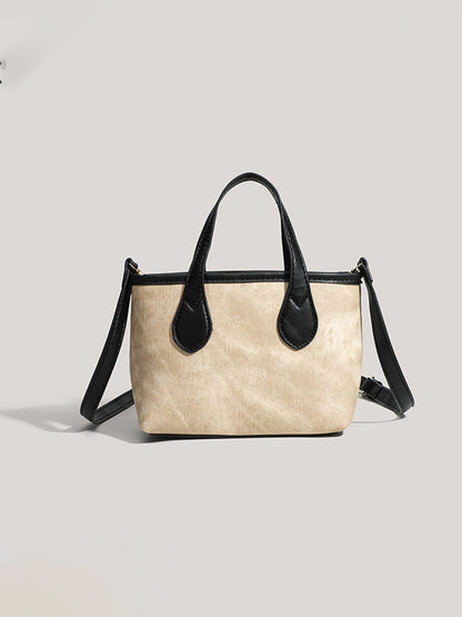 Bolso de mano oblicuo para mujer retro de otoño e invierno Bolso tipo cubo de PU