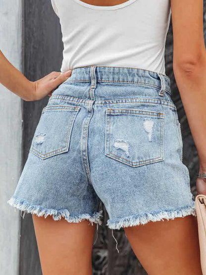 Shorts vaqueros con flecos