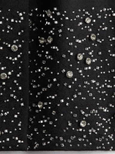 Conjunto de chaqueta y pantalones cortos de twill con adornos de strass