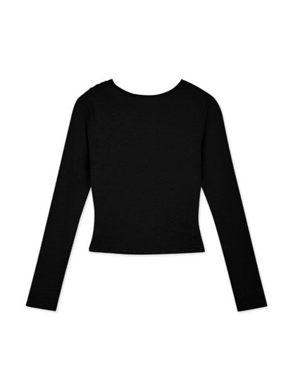 Top de punto de manga larga con lentejuelas negras y minifalda