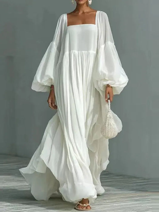 Vestido maxi suelto con cuello cuadrado y mangas abullonadas elegante
