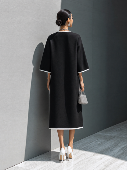 Vestido midi con bolsillo y costuras en contraste