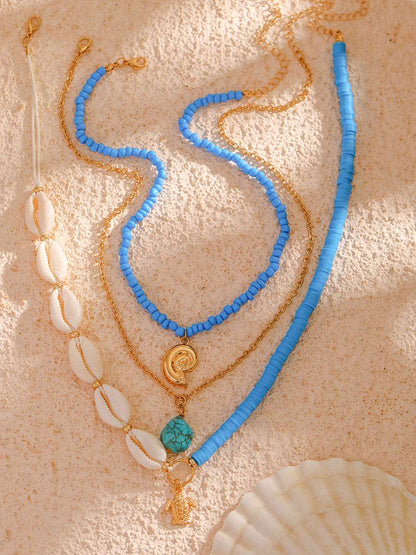 Collar multicapa con cuentas de concha Bora Bora en oro