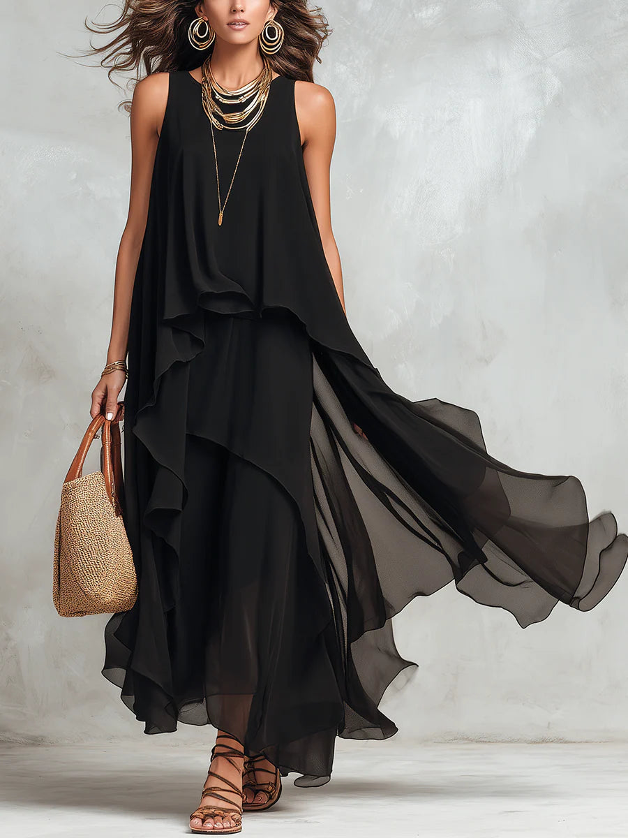 Vestido maxi negro de gasa con capas, cuello redondo y sin mangas