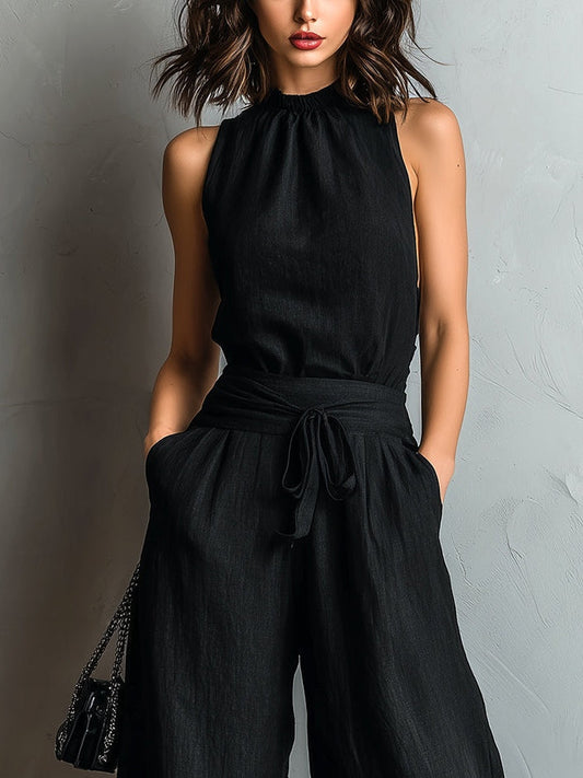 Conjunto de chaleco negro de lino algodón sintético con cuello halter y pantalones de pierna ancha con lazo y encaje