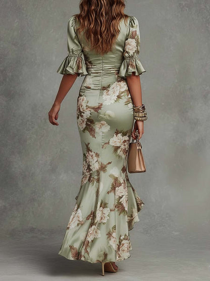 Vestido maxi asimétrico de satén verde con flores, volantes, mangas campana y escote en V