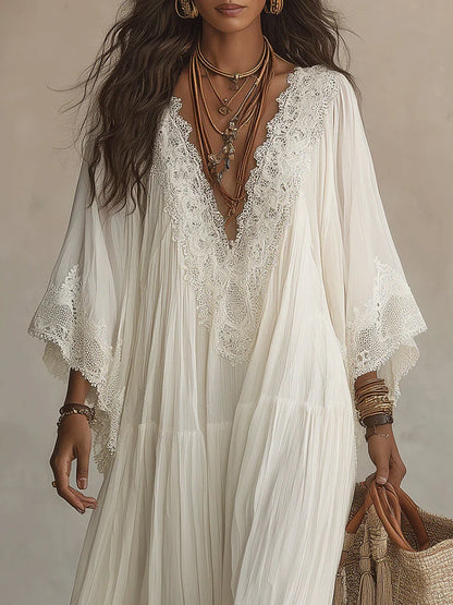 Velora | Vestido largo de gasa color marfil con mangas de murciélago y encaje blanco