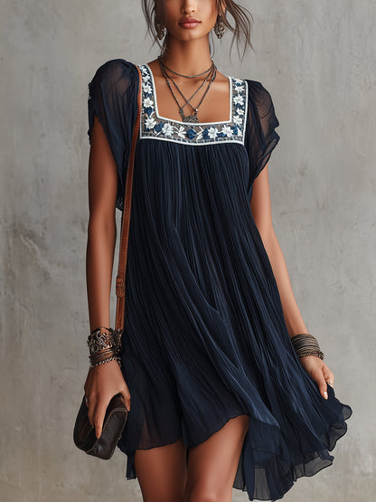 Vestido corto de gasa con bordado floral