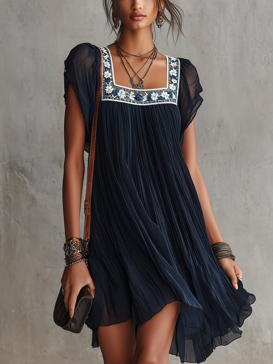Vestido corto de gasa con bordado floral