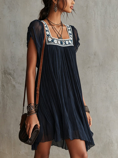 Vestido corto de gasa con bordado floral