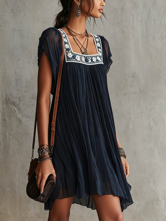 Vestido corto de gasa con bordado floral