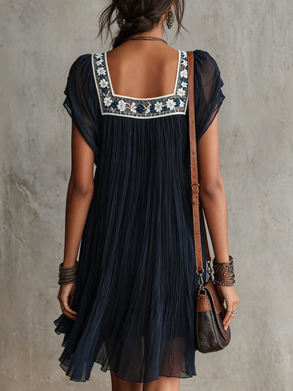 Vestido corto de gasa con bordado floral