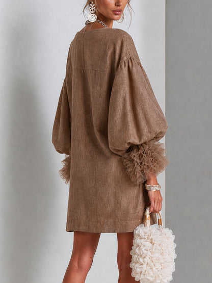 Vestido mini abullonado con cremallera frontal