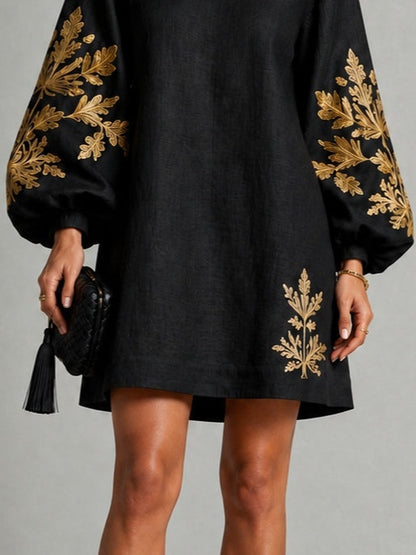 Vestido corto tipo túnica con motivo ornamental y linterna