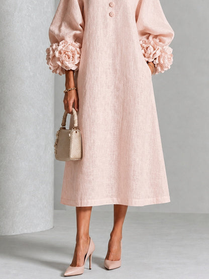 Vestido midi floral con puños abotonados
