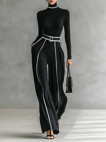 Conjunto de top blanco de cuello alto con mangas largas, pantalones de pierna ancha y cinturón