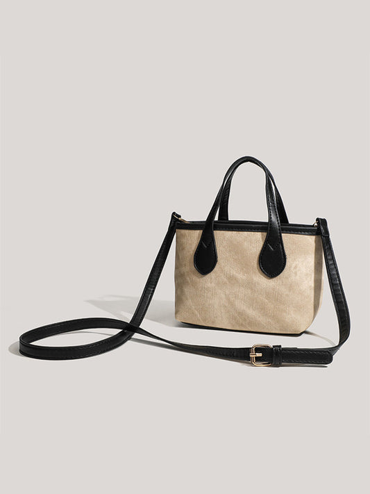 Bolso de mano oblicuo para mujer retro de otoño e invierno Bolso tipo cubo de PU